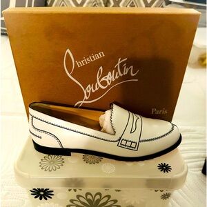 White Christian Louboutin loafer